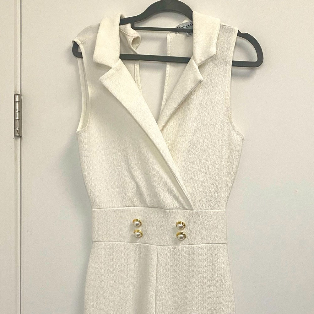 All white jumpsuit, with gold buttons. M size